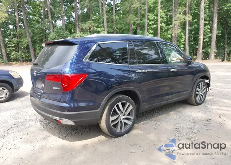2017 Honda Pilot Touring z USA, uszkodzony, nr VIN 5FNYF5H93HB042354